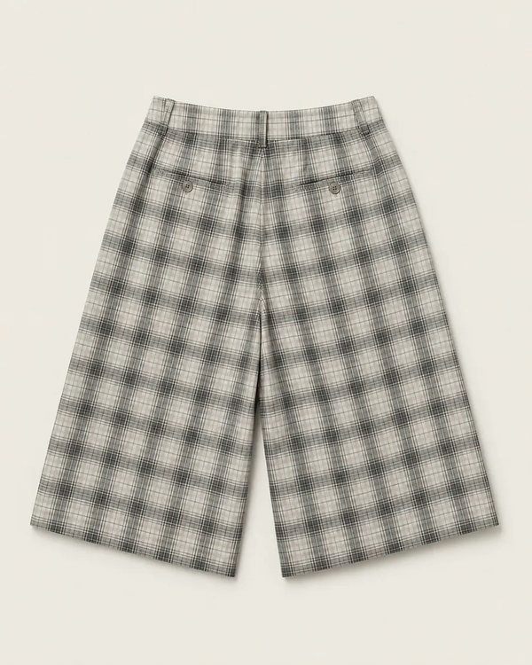 Long pleated shorts in a soft grey and white shadow check.