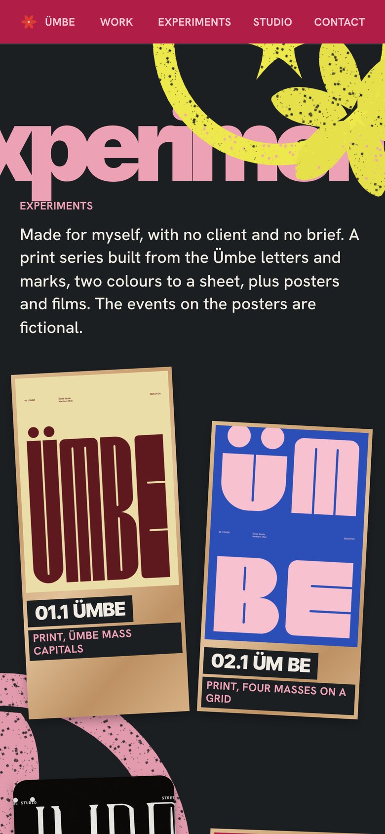 Ümbe on a phone: the experiments section on slate, with two framed prints, the ÜMBE capitals in oxblood and cream and the ÜM BE masses in pink on cobalt.